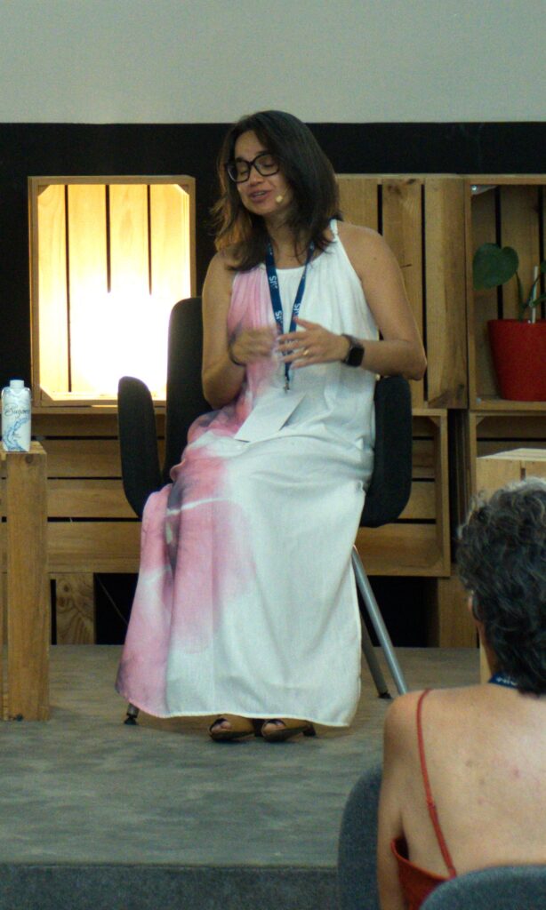 Karen Martínez at the table