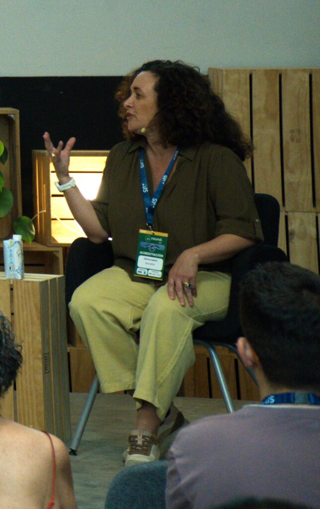 Patrizia Laplana, at the table